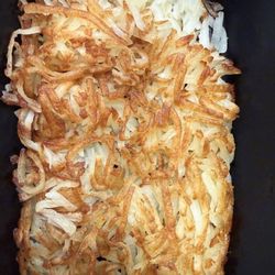 El Vaquero Mexican Restaurant - Hash Browns side to 2 eggs and bacon order