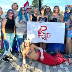 Riptide Masters Swimming - After swim participating in the Mermaid parade