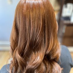 Studio Twelve Hair Designers - Transformation from a greenish,moussy hi lighted hair to a nice warm fall tone