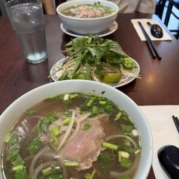 Front: Pho Tai (rare beef) Back: Pho Dac Biet (combination) Front: Pho Tai (rare beef) Back: Pho Dac Biet (combination)