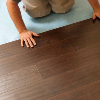 Carpet Exchange - a man installing a hardwood floor - Flooring Near Me - Golden, Colorado Carpet Exchange - a man installing a hardwood floor - Flooring Near Me - Golden, Colorado