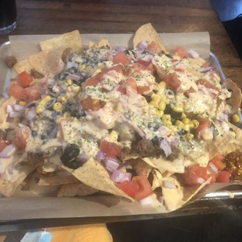 Forty Thieves - The HUGE nacho platter. The onions and queso were my favorite part!!! - Pubs Near Me - Buffalo, New York Forty Thieves - The HUGE nacho platter. The onions and queso were my favorite part!!! - Pubs Near Me - Buffalo, New York