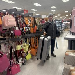 The purses an my husband with some Luggage The purses an my husband with some Luggage