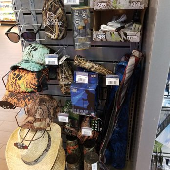RaceTrac - a display of hats and accessories - Gas Stations Near Me - Yulee, Florida RaceTrac - a display of hats and accessories - Gas Stations Near Me - Yulee, Florida