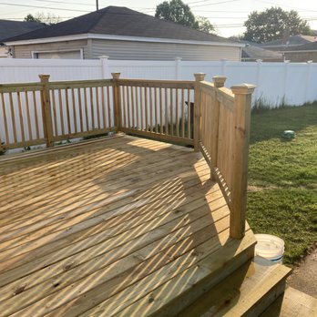 Pch Construction Company - a wooden deck with railings - General Contractors Near Me - Chicago, Illinois