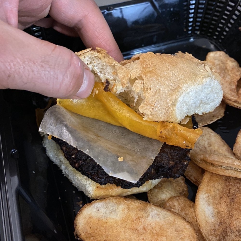 PressRoom Pub - Cheese wrapper on burnt veggie burger - Pubs Near Me - Syracuse, New York PressRoom Pub - Cheese wrapper on burnt veggie burger - Pubs Near Me - Syracuse, New York