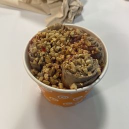 Vegan chocolate, banana mix in, topped with chopped nuts and strawberry syrup Vegan chocolate, banana mix in, topped with chopped nuts and strawberry syrup
