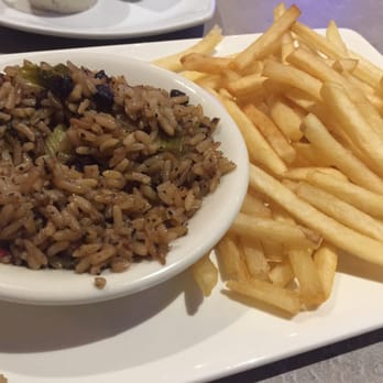 Papa's Raw Bar - Dirty rice and fries, two sides come with the main. - Seafood Near Me - Lighthouse Point, Florida Papa's Raw Bar - Dirty rice and fries, two sides come with the main. - Seafood Near Me - Lighthouse Point, Florida