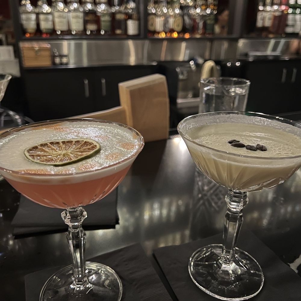 86 Speakeasy - two cocktails on a bar - Cocktail Bars Near Me - Eugene, Oregon