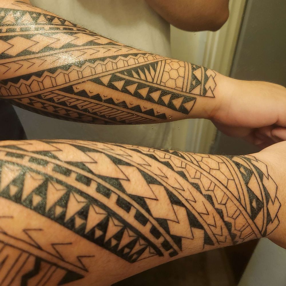 Fort Myers Beach pier tattoo with sunset etched on woman's arm, image size:1000x1000