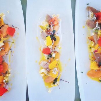 Melogold Kitchen - Ahi Tuna Crudo with leche de tigre, coconut, peach and wildflowers - Food Delivery Services Near Me Melogold Kitchen - Ahi Tuna Crudo with leche de tigre, coconut, peach and wildflowers - Food Delivery Services Near Me