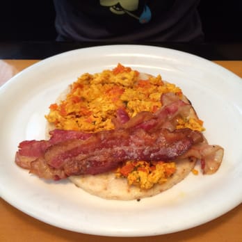 Sabor Latino - Arepa con huevos perico (we added bacon) - Latin American Near Me - Greenacres, Florida Sabor Latino - Arepa con huevos perico (we added bacon) - Latin American Near Me - Greenacres, Florida