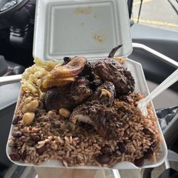 Peppers Jamaican Bakery & Center - A example of the generous portion in the "medium" combo. Minus a plantain, because I couldn't help myself. :)
