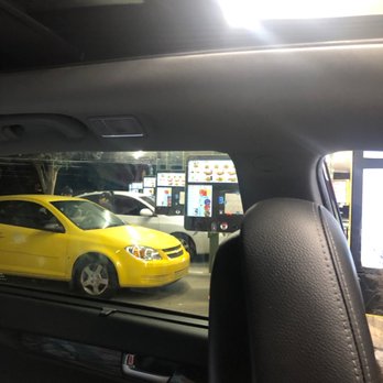 Sonic Drive-In - a yellow car in a parking garage - Burgers Near Me - Port Richey, Florida Sonic Drive-In - a yellow car in a parking garage - Burgers Near Me - Port Richey, Florida