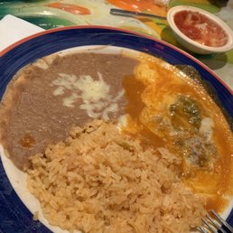 A small piece of pepper, rice, and beans (Chile Relleno).