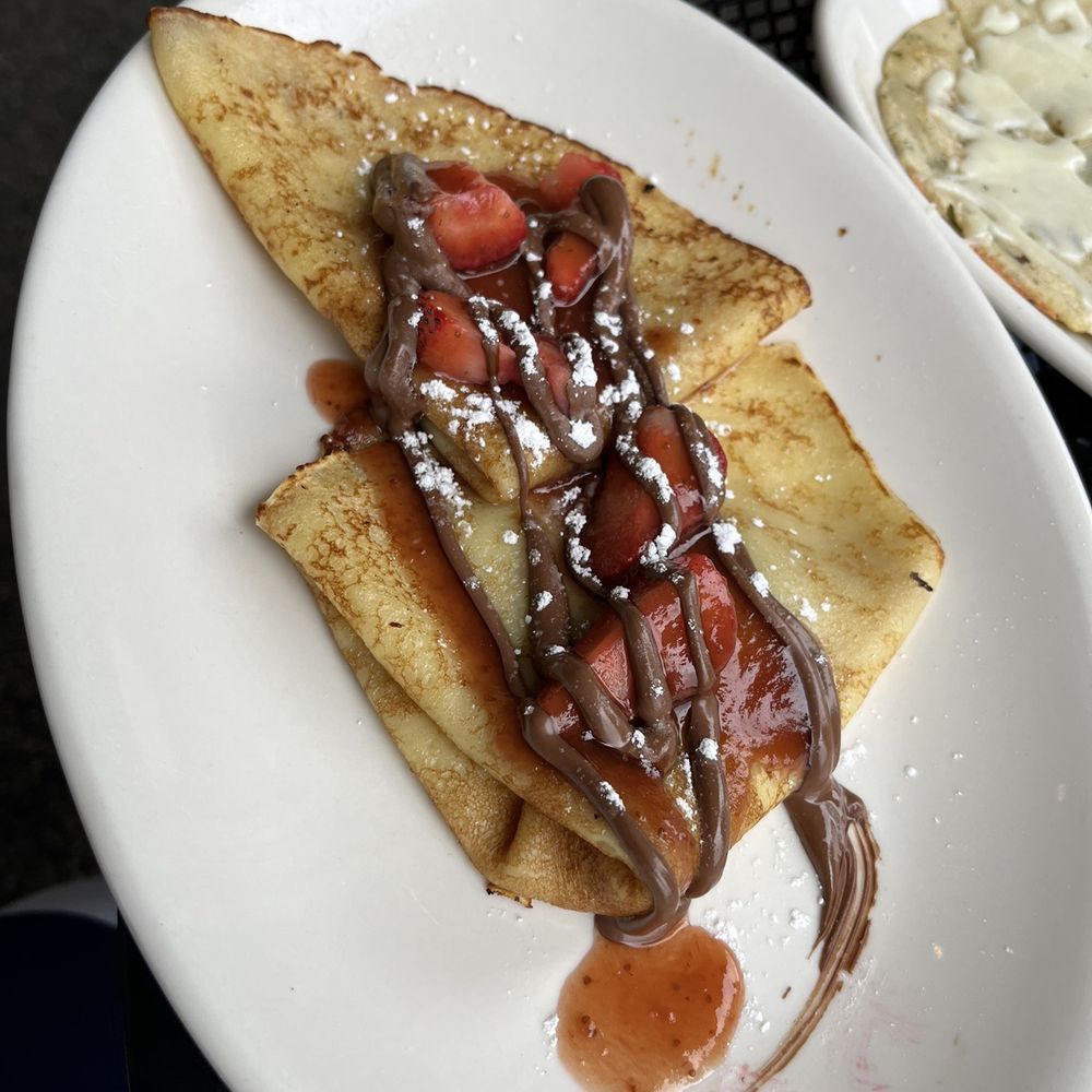 Nosh - Strawberry and Nutella crepes - half order - New American Near Me - Geneva, Illinois Nosh - Strawberry and Nutella crepes - half order - New American Near Me - Geneva, Illinois