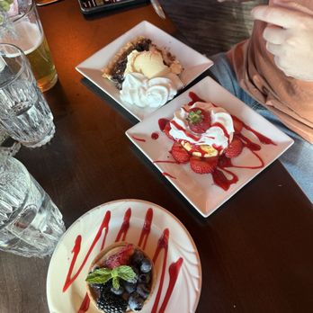 The Peaks Restaurant - Top to bottom- chocolate pecan pie, cheesecake, and the lemon tart - American Near Me - Moran, Wyoming