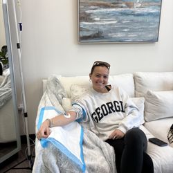Hydrate GA - Happy guest receiving an IV