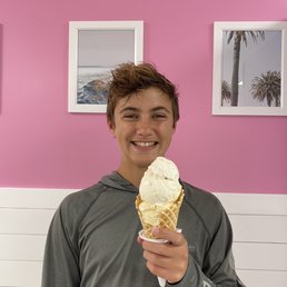 Homemade waffle cone with one scoop apple crisp and one scoop pumpkin marshmallow cream Homemade waffle cone with one scoop apple crisp and one scoop pumpkin marshmallow cream