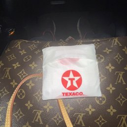 Reusable bag folded up in a pouch
