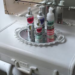 The Doux Salon - Premium products perched in the front window!
