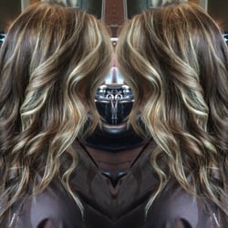 Bombshell Studio of Hair  - Balayage with color melting for dimension.
