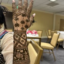 Back hand mehndi art by my team