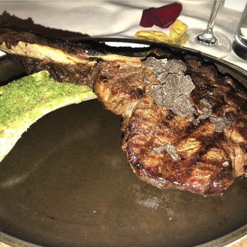 Reserve Cut - Tomahawk ribeye w/ shaved black Truffles - Steakhouses Near Me - New York, New York Reserve Cut - Tomahawk ribeye w/ shaved black Truffles - Steakhouses Near Me - New York, New York