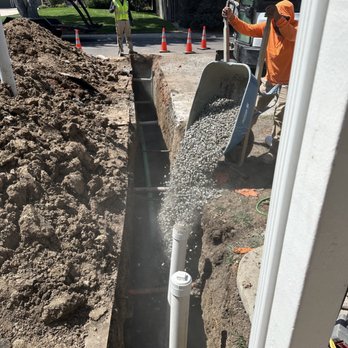 Sewer Lines Only - Putting a gravel bed around the pipe before backfilling with dirt - Plumbing Near Me - Lakewood, Colorado
