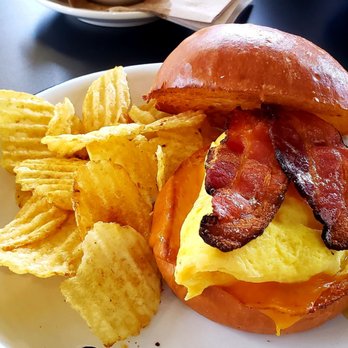 Vesta Coffee Roasters - Vesta breakfast sandwich with bacon and a side of potato chips. - Coffee & Tea Near Me - Las Vegas, Nevada