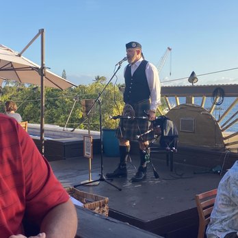 Fleetwood's on Front St - The entertainment in the view of the ocean from the rooftop of Fleetwoods. - New American Near Me - Lahaina, Hawaii