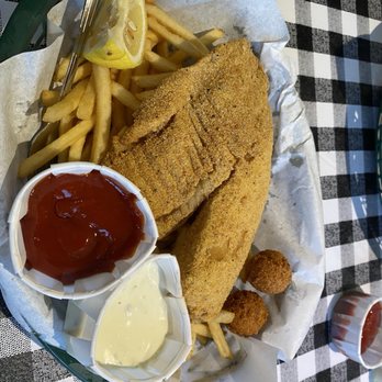 Flying Fish Plano, TX on North Preston Rd - Fried tilapia filet with french fries and 2 hushpuppies - Seafood Near Me - Plano, Texas