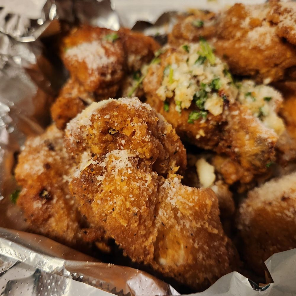 Amici's Pizza Cafe - Winggs...wings...wings! Garlic parmen... - Italian Near Me - Coconut Creek, Florida Amici's Pizza Cafe - Winggs...wings...wings! Garlic parmen... - Italian Near Me - Coconut Creek, Florida