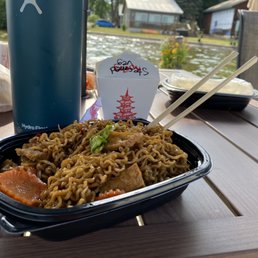 a bowl of noodles and chopsticks a bowl of noodles and chopsticks