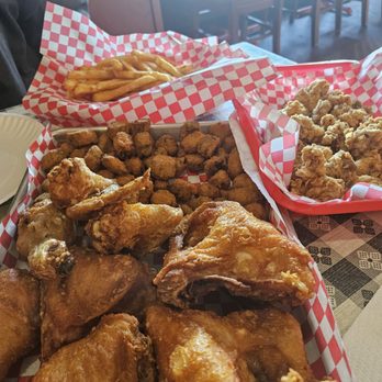 Chicken Shack 2 Go - Whole brosted chicken, fried okra with fries and chicken gizzards in the background. - Salad Near Me - Oklahoma City, Oklahoma