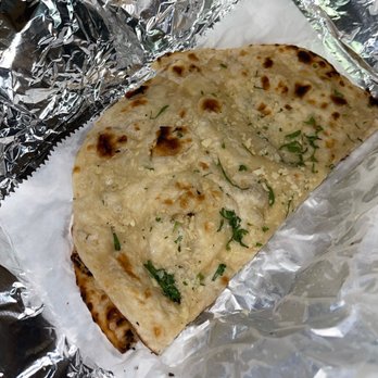 Dakshin Indian Grill - Garlic Naan | Instagram @Kurlykonnoisseur - Indian Near Me - Charlotte, North Carolina Dakshin Indian Grill - Garlic Naan | Instagram @Kurlykonnoisseur - Indian Near Me - Charlotte, North Carolina