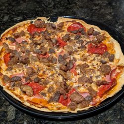 US Pizza - Bryant - 10" meatza pizza. Nice thin crust, lots of toppings.
