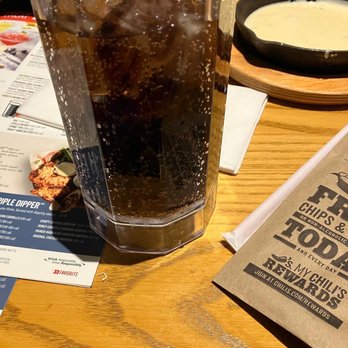 Chili's - a glass of soda and a menu - American Near Me - Peoria, Arizona Chili's - a glass of soda and a menu - American Near Me - Peoria, Arizona