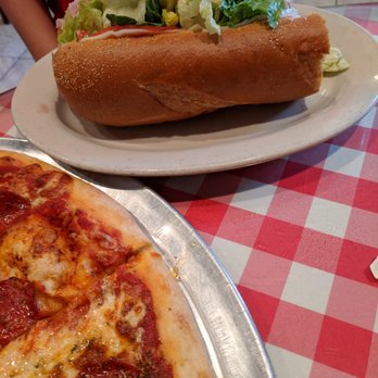 Lennys New York Pizza Company - Gigantic 1/2 italian sub takes up plate. This is the smaller sub 1/2 size - Pizza Near Me - Ormond Beach, Florida Lennys New York Pizza Company - Gigantic 1/2 italian sub takes up plate. This is the smaller sub 1/2 size - Pizza Near Me - Ormond Beach, Florida