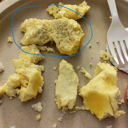 Comfort Inn Naples East I-75 - Dark area of scrambled eggs. Needless to say - I stopped eating the eggs.