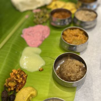 A2B Veg Restaurant - a banana leaf with a variety of dishes on it - Indian Near Me - South Plainfield, New Jersey A2B Veg Restaurant - a banana leaf with a variety of dishes on it - Indian Near Me - South Plainfield, New Jersey