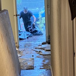 Working in a downpour! Working in a downpour!