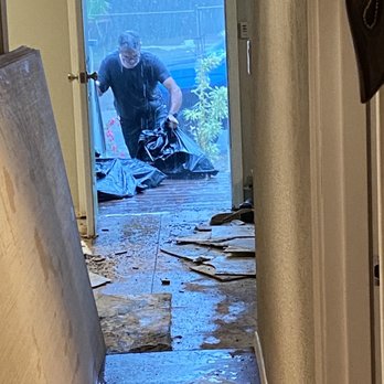 Bauer Flooring & Tile LLC - Working in a downpour! - Flooring Near Me - Waipahu, Hawaii Bauer Flooring & Tile LLC - Working in a downpour! - Flooring Near Me - Waipahu, Hawaii