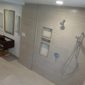 A Custom Creation Tile & Stone - Out of true wall straight as arrow. - Tiling Near Me A Custom Creation Tile & Stone - Out of true wall straight as arrow. - Tiling Near Me