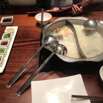 Q Restaurant - Tonkotsu broth (left), blackened chicken broth (right) - Chinese Near Me - Boston, Massachusetts Q Restaurant - Tonkotsu broth (left), blackened chicken broth (right) - Chinese Near Me - Boston, Massachusetts