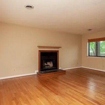 Rodney's Painting Service - Living Room/ fire place before - Painters Near Me - Charlottesville, Virginia Rodney's Painting Service - Living Room/ fire place before - Painters Near Me - Charlottesville, Virginia