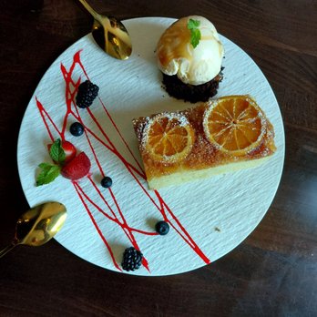 Cali Chilli - Orange Upside Down Cake with vanilla bean ice cream. - Indian Near Me - Long Beach, California