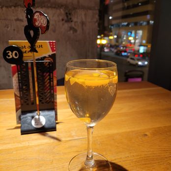 Nando's Peri-Peri - Peach-mango sangria - Portuguese Near Me - Chicago, Illinois
