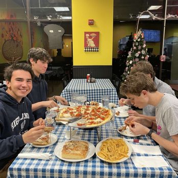 Crazy For Pizza - Group of young men at their favorite restaurant. - Pizza Near Me - Vernon Hills, Illinois Crazy For Pizza - Group of young men at their favorite restaurant. - Pizza Near Me - Vernon Hills, Illinois