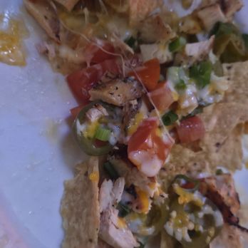 Texas Chili Parlor - Half Eaten chicken nachos - American Near Me - Austin, Texas